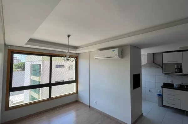 Moinhos Imobiliária aluga apartamento semimobiliado no Passo da Areia: 3 dormitórios (1 suíte), 2 vagas individuais e churrasqueira.