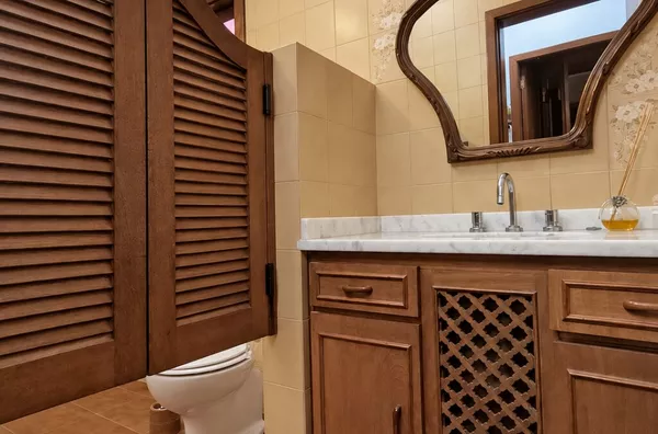 Moinhos Imobiliária vende | Ampla casa de 270 m² no Auxiliadora, com 3 dormitórios, suíte master e 2 vagas, em excelente localização - Foto 13