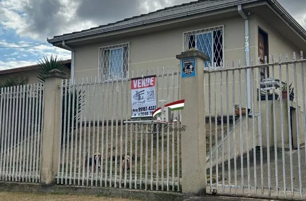 Casa com terreno de 603m² para venda no Novo Mundo, Curitiba