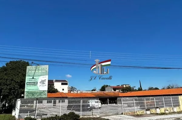 Loja comercial de esquina com 1210m² para alugar no Novo Mundo