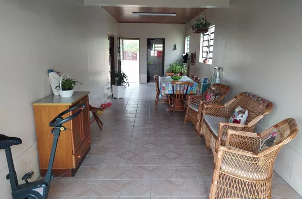 Terreno com três casas - Restinga