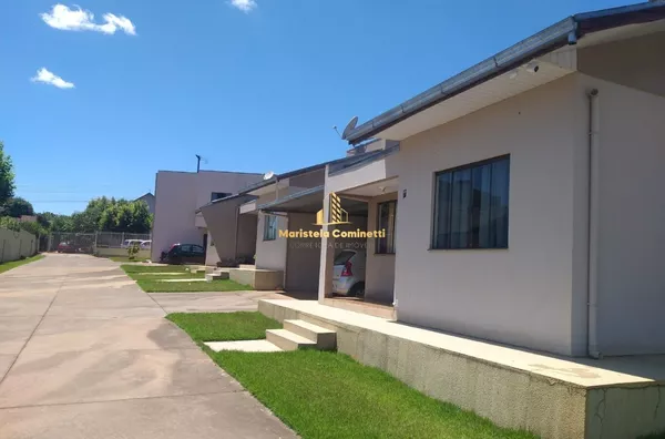 Condomínio com 8 casas e um prédio à venda!